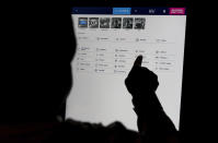 A man navigates a sports betting kiosk at Turfway Park Racing & Gaming, Friday, Dec. 22, 2023, in Florence, Ky. Sports betting has spread rapidly across U.S. states in the past five years. But the odds for further expansion may be fading as state legislatures prepare to return to work in 2024. (AP Photo/Carolyn Kaster)