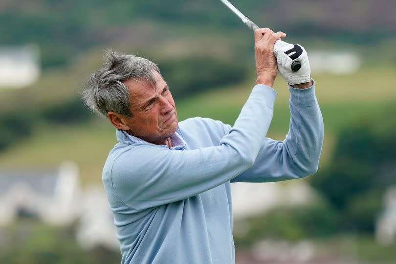 Liverpool legend Alan Hansen plays golf.