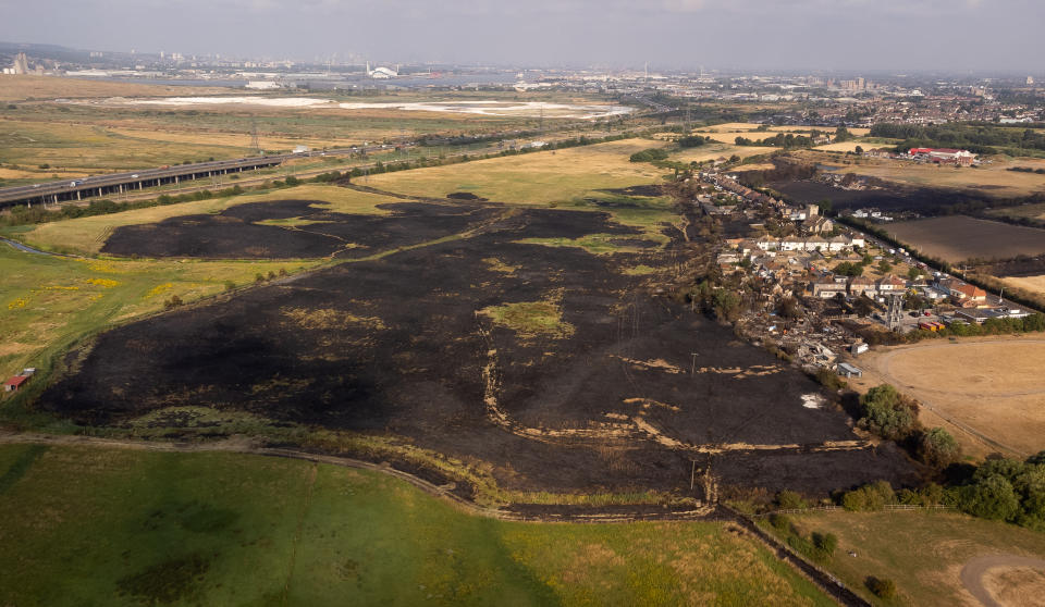 The scene after a blaze in the village of Wennington, east London after temperatures topped 40C in the UK for the first time ever, as the sweltering heat fuelled fires and widespread transport disruption. Picture date: Wednesday July 20, 2022.