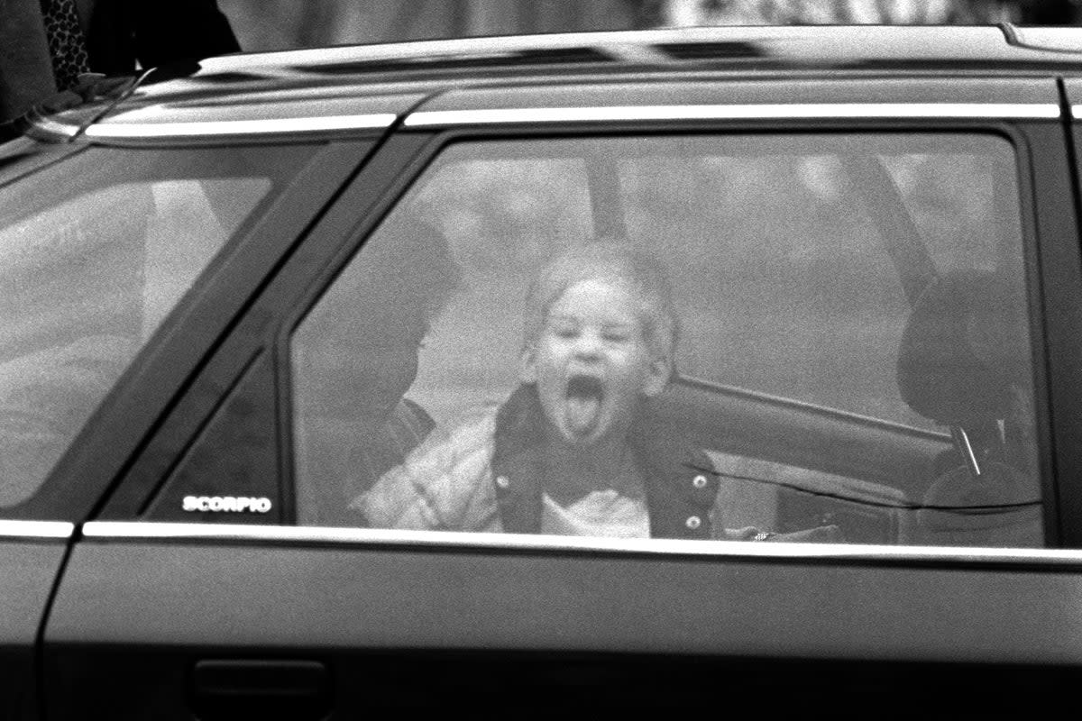 Duke of Sussex 40th birthday: <p>A three-year-old Prince Harry sticks out his tongue at photographers </p> (PA)