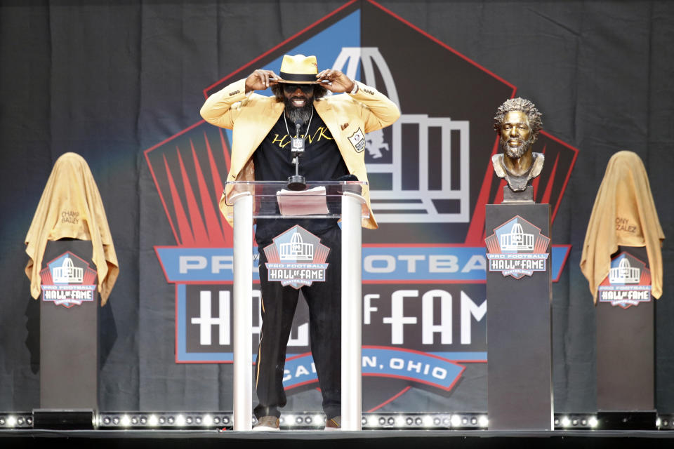 Ed Reed wearing yellow jacket and matching hat.