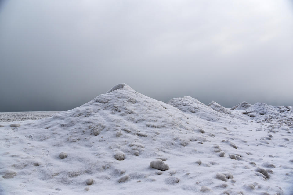 Image: Ice volcanoes form along Lake Michigan. (Zoe Finney / Schlitz Audubon Nature Center)