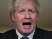 Britain's Prime Minister Boris Johnson speaks during a coronavirus press conference at 10 Downing Street in London, Friday Jan. 22, 2021. Johnson announced that the new variant of COVID-19, which was first discovered in the south of England, may be linked with a possible increase in the mortality rate. (Leon Neal/Pool via AP)