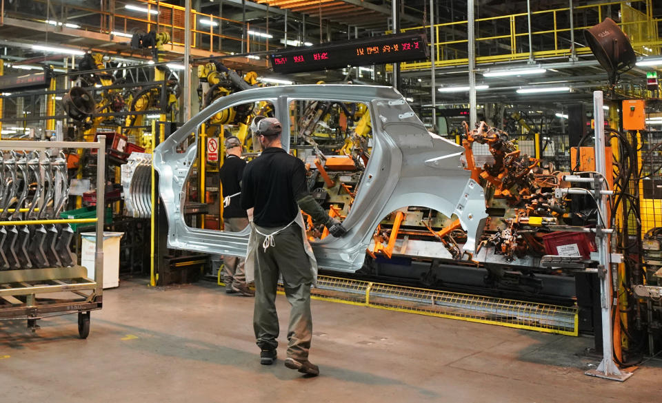 Workers on the production line at Nissan's factory in Sunderland after they were told that the car manufacturer is to end the night shift at its UK plant.