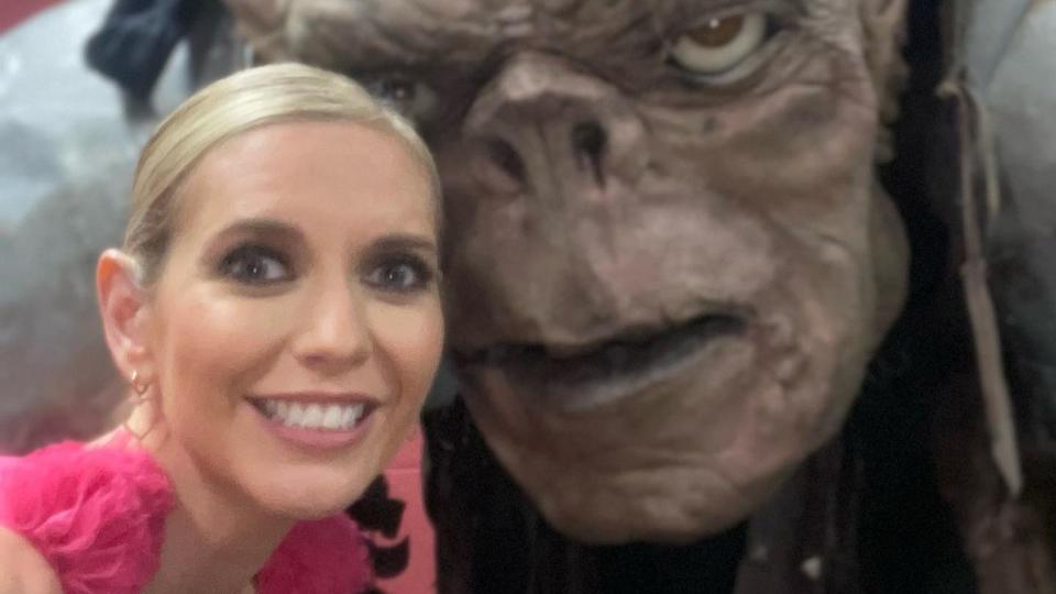 woman taking selfie with troll 