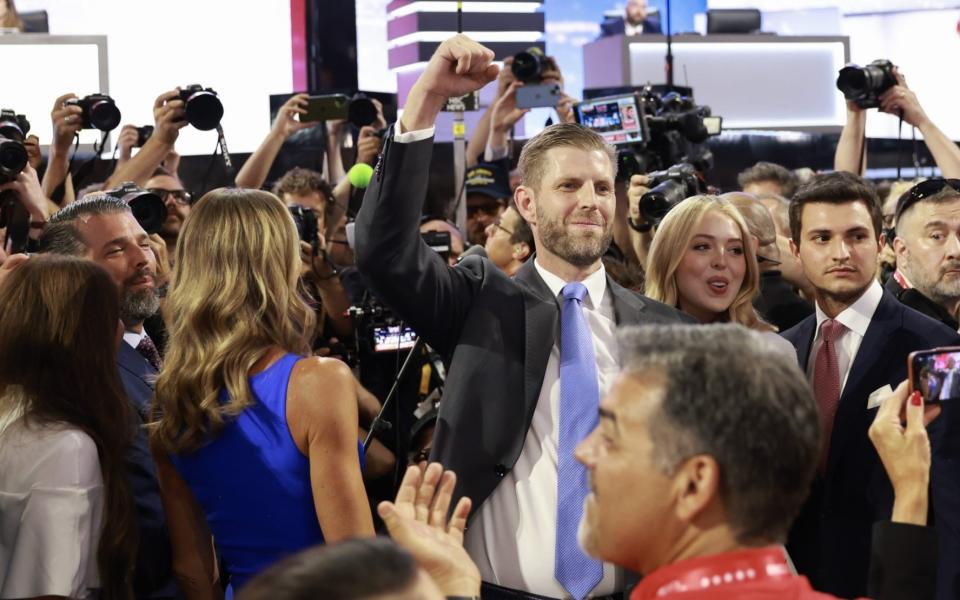 Donald Trump Jr, Eric Trump and Tiffany Trump celebrate as their father, Donald Trump, wins the Republican nomination