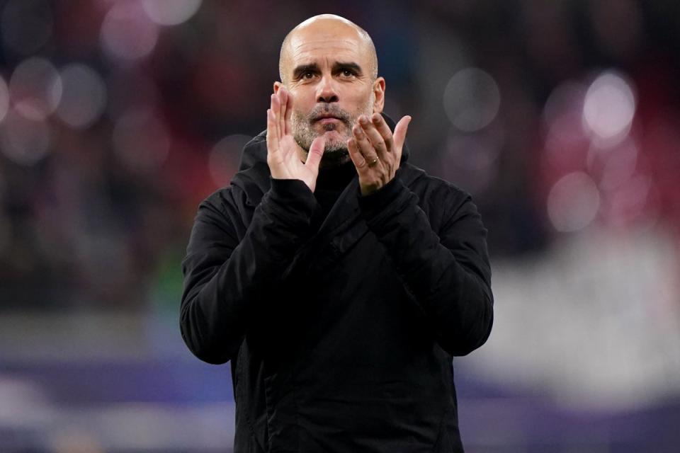 Manchester City manager Pep Guardiola applauds the fans after the Champions League draw at RB Leipzig (Tim Goode/PA) (PA Wire)