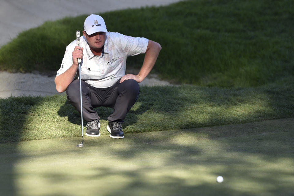 Jason Kokrak lines up a putt during the final round of the CJ Cup golf tournament at Shadow Creek Golf Course, Sunday, Oct. 18, 2020, in North Las Vegas. (AP Photo/David Becker)