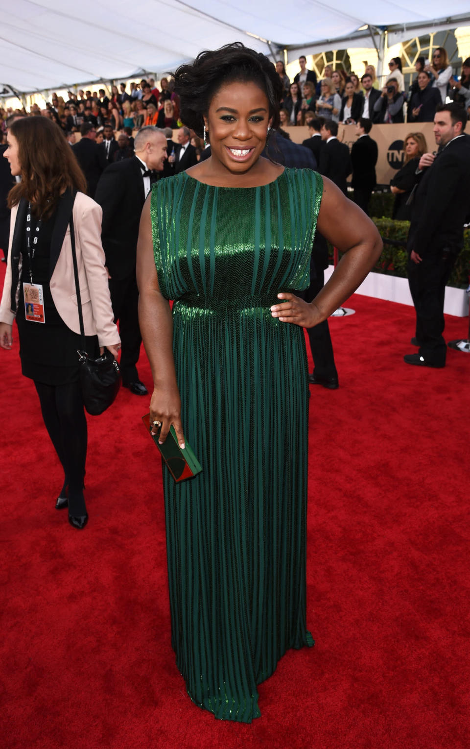 Uzo Aduba in an emerald green sequin gown by Zac Posen at the 22nd Annual Screen Actors Guild Awards at The Shrine Auditorium on January 30, 2016 in Los Angeles, California.
