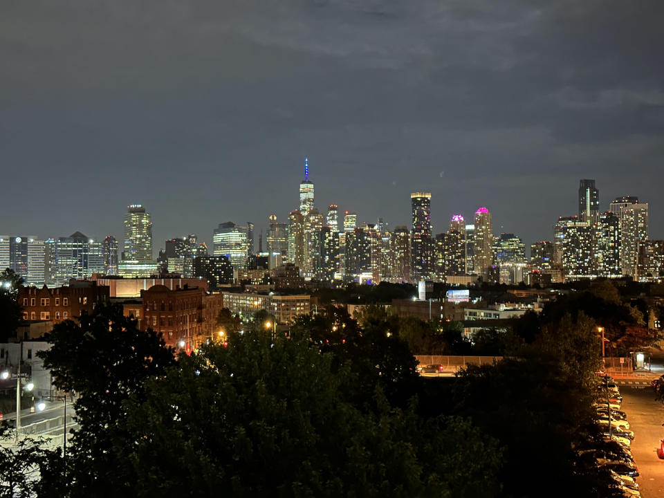 <p>A photo from the iPhone 14 Pro's main camera of Manhattan buildings at night.</p>
