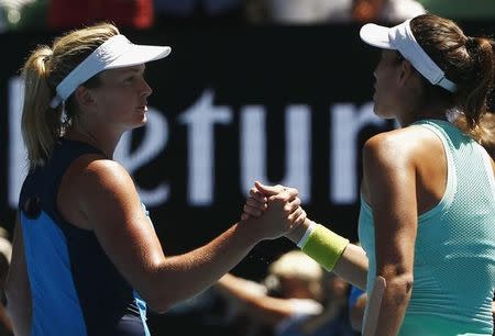 Tennis - Australian Open - Melbourne Park, Melbourne, Australia - 24/1/17 Coco Vandeweghe of the U.S. shakes hands after winning her Women's singles quarter-final match against Spain's Garbine Muguruza. REUTERS/Thomas Peter