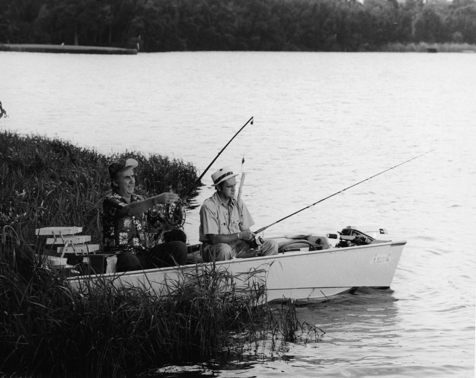 <p>Ed McMahon fishes with Bob Newhart from a rowboat in Cypress Gardens, Florida in 1972.</p>