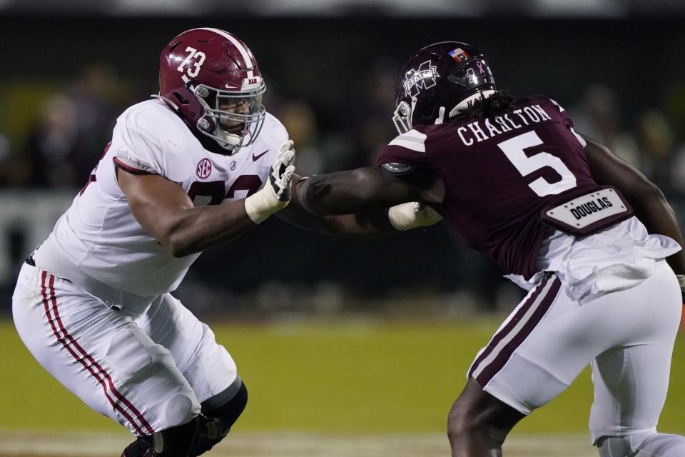 Alabama offensive lineman Evan Neal (73) blocks Mississippi State defensive end Randy Charlton in October.