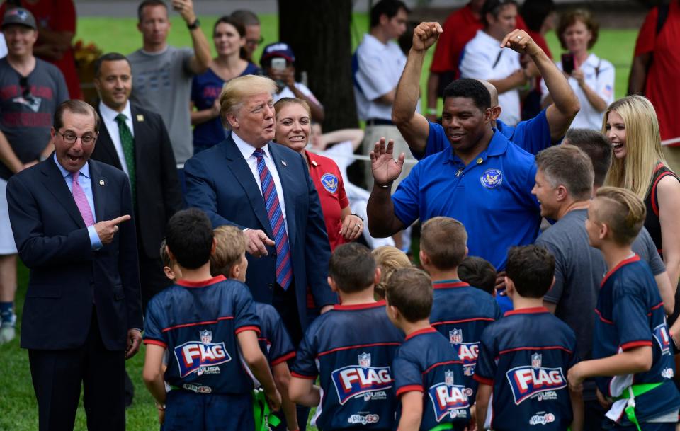 Donald Trump and Herschel Walker.