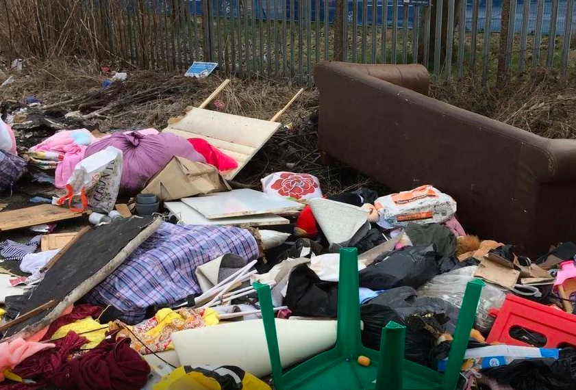 <em>Vandals left a 100m-long line of waste down a Bradford lane (SWNS)</em>