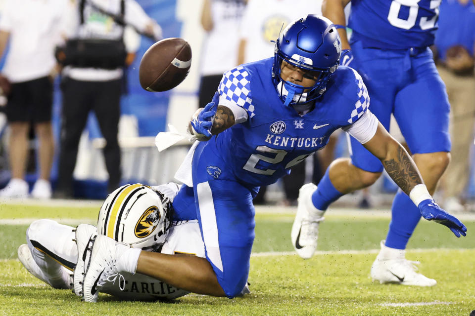 Kentucky running back Chris Rodriguez Jr. (24) fumbles the ball near the end zone during the first half of the team's NCAA college football game against Missouri in Lexington, Ky., Saturday, Sept. 11, 2021. (AP Photo/Michael Clubb)