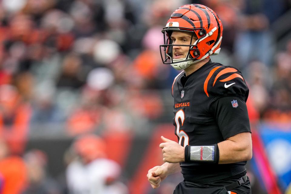 Cincinnati Bengals quarterback Jake Browning (6) runs to the line after a first town pass in the second quarter of the NFL Week 18 game between the Cincinnati Bengals and the Cleveland Browns at Paycor Stadium in downtown Cincinnati on Sunday, Jan. 7, 2024.