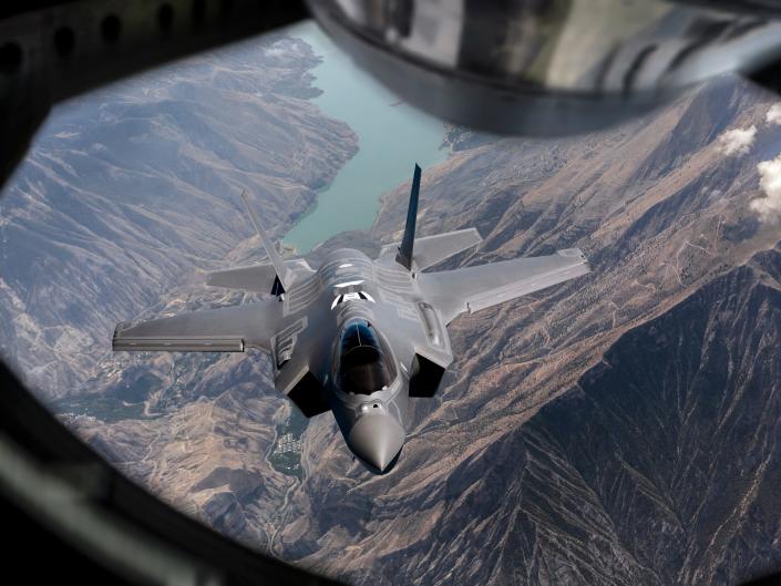 F-35 jet fighter refueling mid-air.
