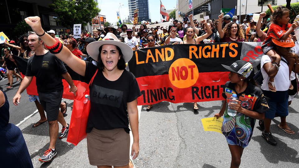 There was less drama with protests in Brisbane as those involved took to the streets to condemn the January 26 date. Source: AAP