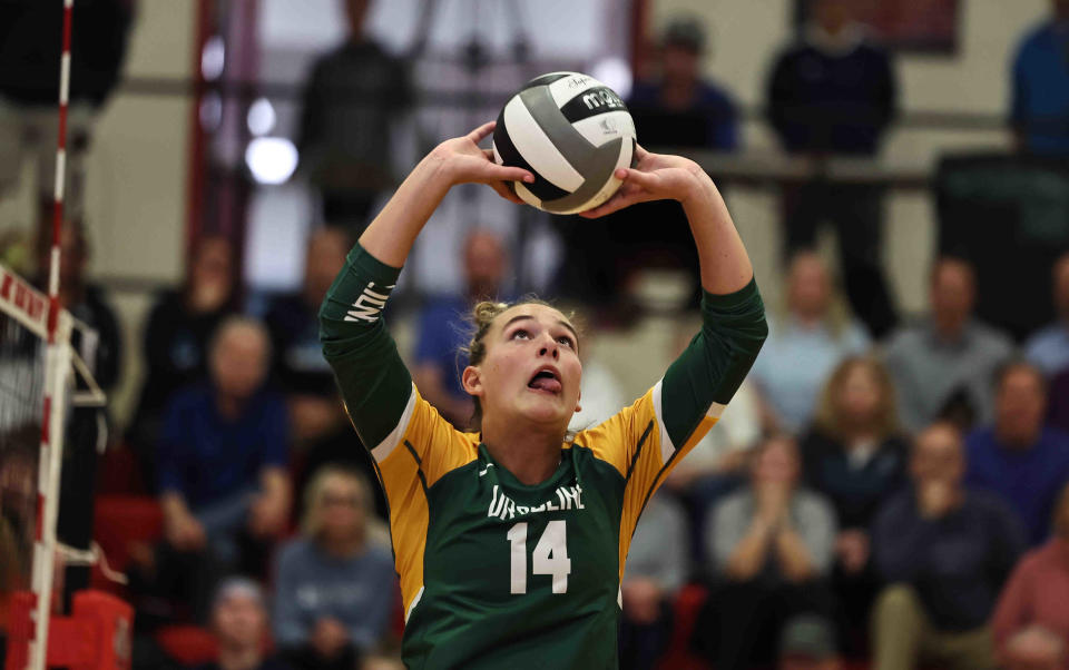 Ursuline Academy's Lindsey Green (14) sets up a teammate during the regional semifinal against Mt. Notre Dame at Lakota West High School Wednesday.