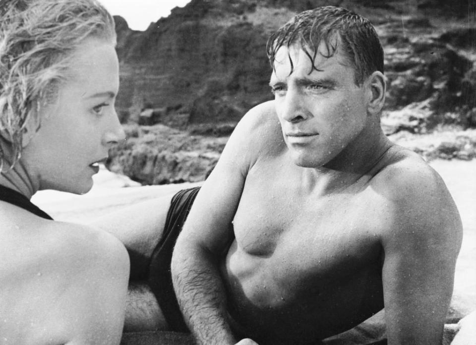 Burt Lancaster and Deborah Kerr get passionate on a beach in the classic love scene from Fred Zinnemann's 'From Here to Eternity'