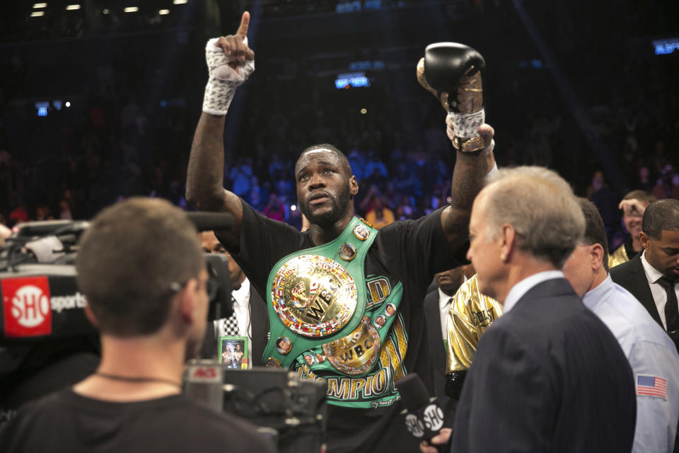 WBC heavyweight champ Deontay Wilder called out Anthony Joshua for a fight back in March, but it’s not happening yet. (AP)
