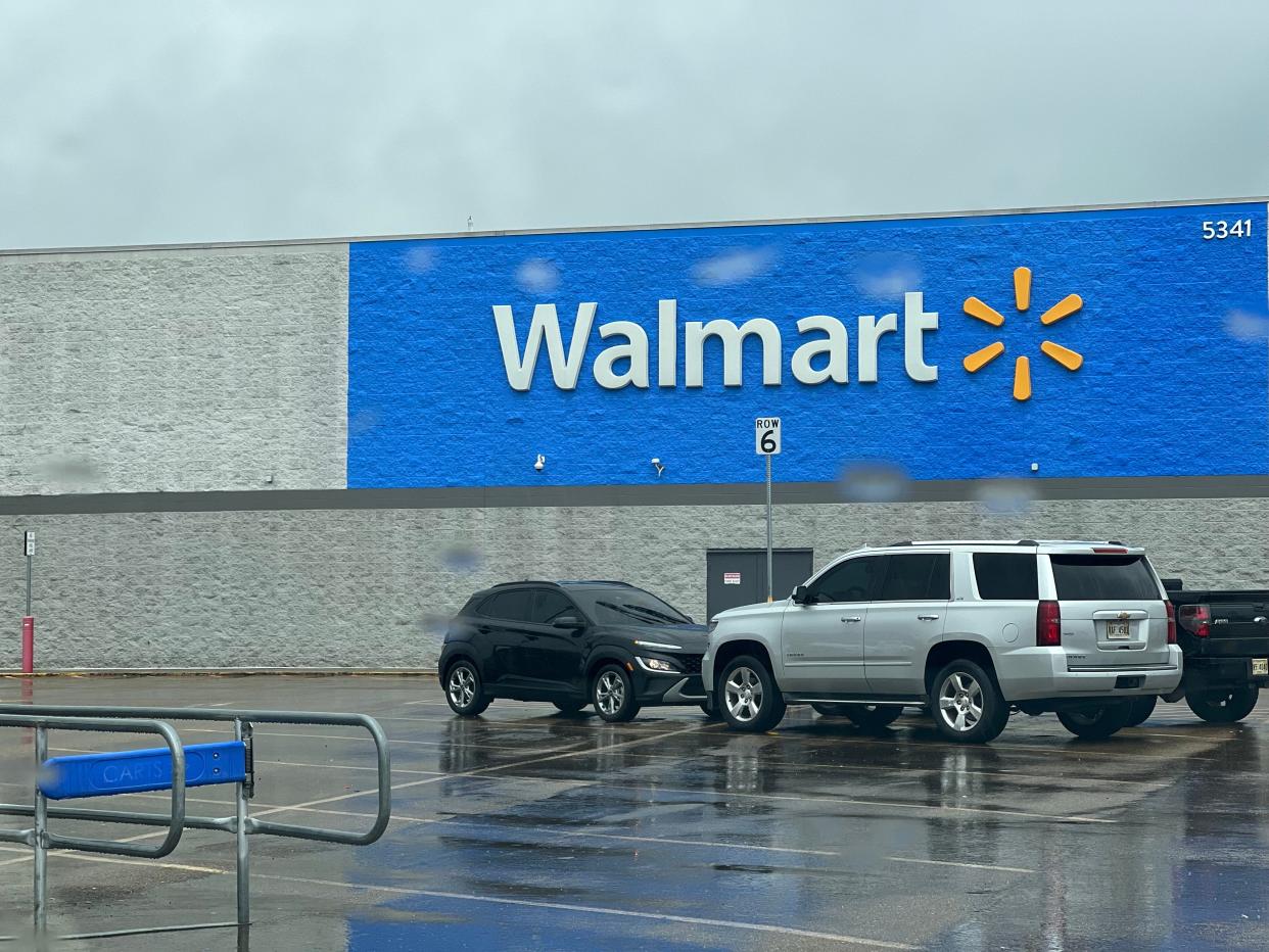 Closing sign outside of Flowood Walmart.