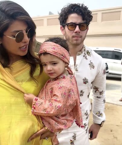 <p>Priyanka Chopra/Instagram</p> Priyanka Chopra Jonas and Nick Jonas with their daughter Malti Marie