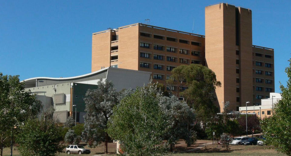 ACT Police were called to Canberra Hospital after a man allegedly stole a police officer’s weapon.