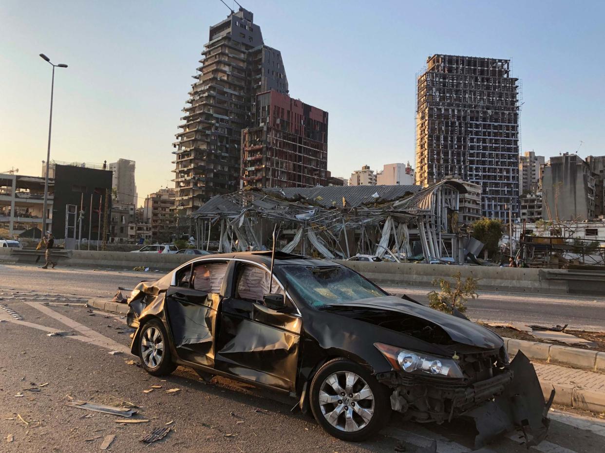 Damaged vehicle and buildings are pictured near the site of Tuesday's blast in Beirut's port area, Lebanon August 5, 2020: Reuters