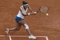 Tennis - French Open - Roland Garros - Serena Williams of the U.S. vs Teliana Pereira of Brazil - Paris, France - 26/05/16. Pereira returns the ball. REUTERS/Gonzalo Fuentes