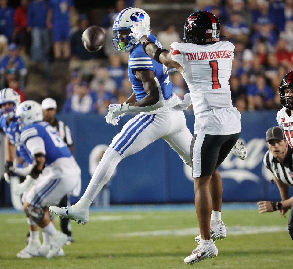 Brigham Young Cougars wide receiver Darius Lassiter (5) can’t complete the catch against Texas Tech Red Raiders defensive back Dadrion Taylor-Demerson (1) in Provo on Saturday, Oct. 21, 2023. BYU won 27-14. | Jeffrey D. Allred, Deseret News