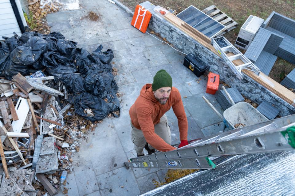 Home inspector Joe Mazza investigates the roof, as seen on HGTV's "Home Inspector Joe."