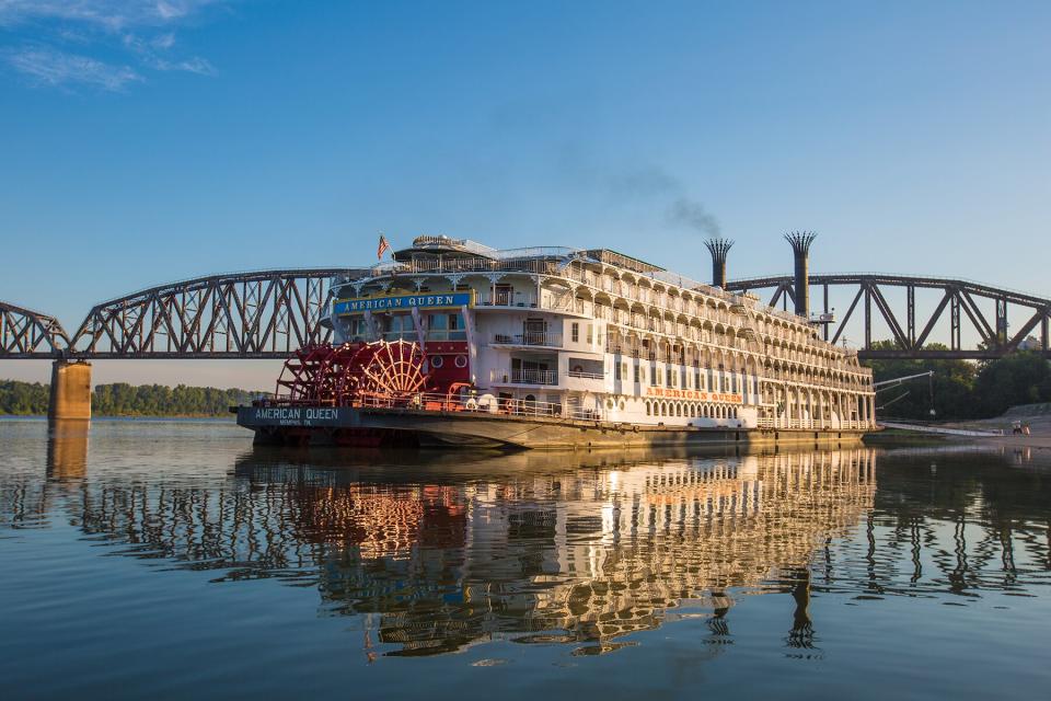 American Queen Ship going under a bridge in Cincinnati