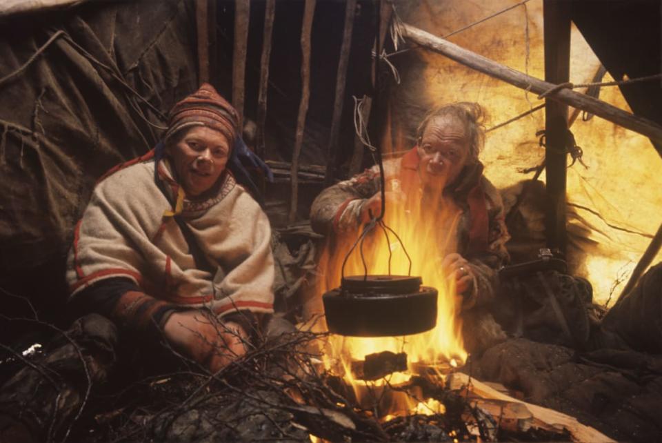 <div class="inline-image__caption"><p>Reindeer Migration Post Easter 1960, Kautekeino, Norway. An enlightening “Coffee Cook” with herders, Anders and Nils-Peter Sarah.  </p><p><b> “</b>I met Anders and Nils-Peder Sara in Kautekeino, Norway which means in Samisk “between the reindeer grounds of the winter and the summer pasture by the sea.” An arduous education in ‘cultural communication’ was made possible by the frequent ‘coffee cooks’ where I learned from my hosts the Samisk survival lifestyle on many levels.” </p></div> <div class="inline-image__credit">All photographs are copyright Fred Baldwin from the book Dear Mr. Picasso: An Illustrated Love Affair with Freedom published by Schilt Publishing</div>