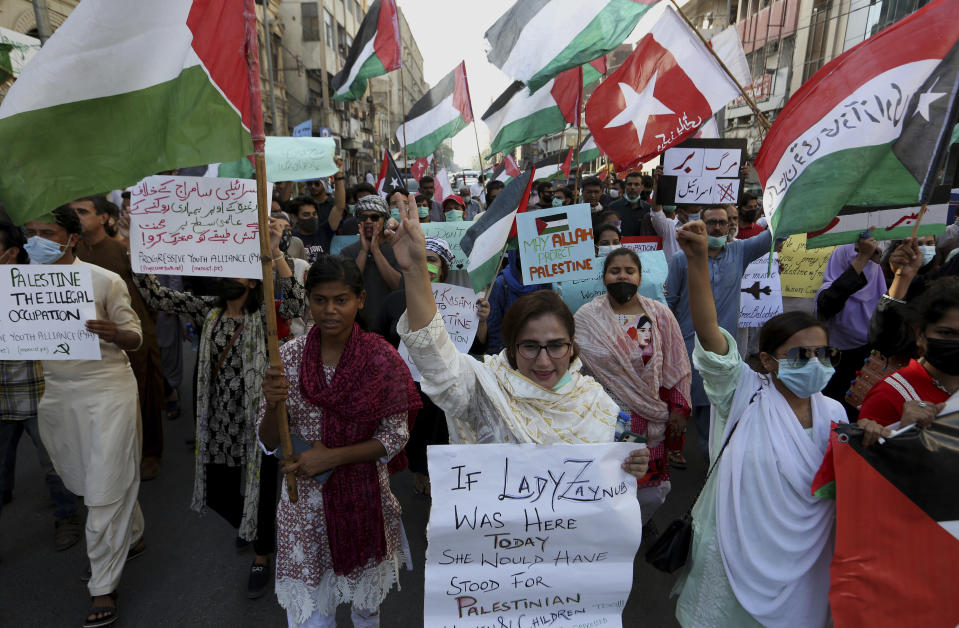 People take part in a rally in support of Palestinians, in Karachi, Pakistan, Thursday, May 20, 2021. (AP Photo/Fareed Khan)