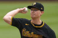 Pittsburgh Pirates starting pitcher Mitch Keller delivers during the first inning of a baseball game against the Milwaukee Brewers in Pittsburgh, Thursday, April 25, 2024. (AP Photo/Gene J. Puskar)