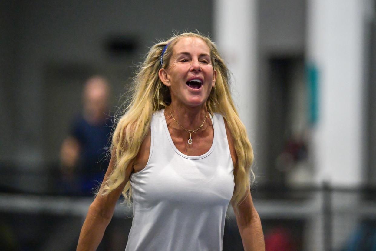 Carling Bassett-Seguso celebrates a good shot while practicing recently at the Diadem indoor pickleball complex on the Broward College campus in Coconut Creek.
