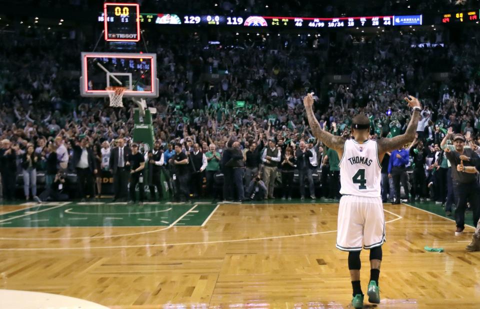 Isaiah Thomas receives a well-earned ovation. (AP)