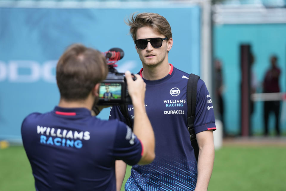 Williams driver Logan Sargeant of the U.S. arrives ahead of the Formula One Miami Grand Prix auto race at the Miami International Autodrome, Friday, May 3, 2024, in Miami Gardens, Fla. (AP Photo/Wilfredo Lee)