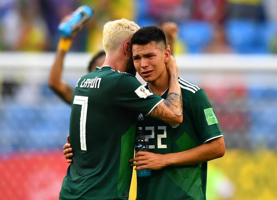 <p>Mexico’s Hirving Lozano and Miguel Layun look dejected after the match REUTERS/Dylan Martinez </p>