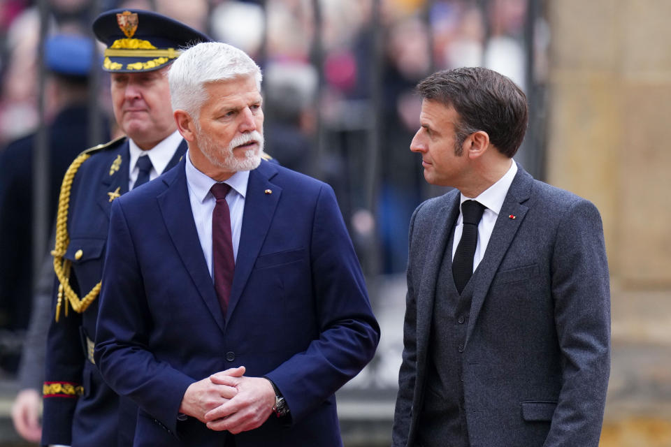 Czech Republic's President Petr Pavel, left, welcomes his French counterpart Emmanuel Macron at the Prague Castle in Prague, Czech Republic, Tuesday, March 5, 2024. Macron is on a one-day official visit to Czech Republic. (AP Photo/Petr David Josek)