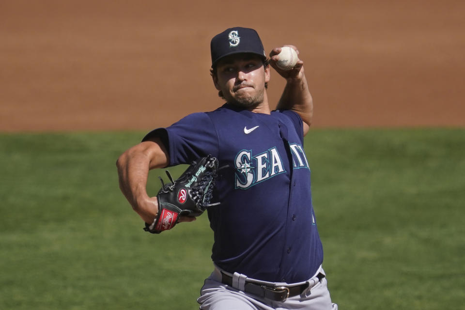 Seattle Mariners' Marco Gonzales pitches against the Oakland Athletics during the first inning of a baseball game in Oakland, Calif., Sunday, Sept. 27, 2020. (AP Photo/Jeff Chiu)