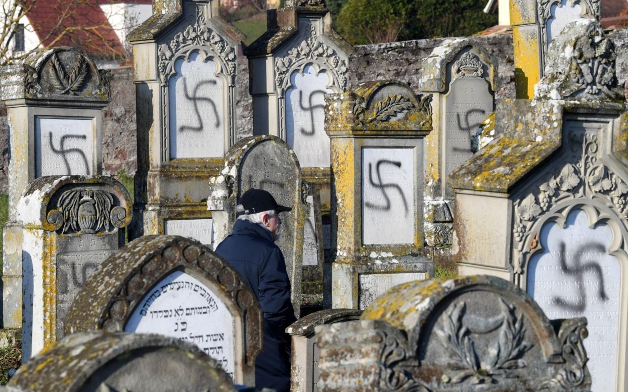 Anti-Semitism is a crime, said President Emmanuel Macron, after 107 Jewish graves were desecrated in Alsace, eastern France - Maxppp