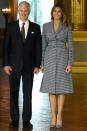 <p>For her meeting with the King and Queen of Belgium, the First Lady wore a Michael Kors collection ensemble: a gingham suit dress and matching gingham Manolo Blahnik pumps.</p>