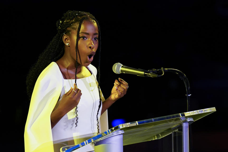 Amanda Gorman recites a poem during an event called "SDG Moment" at United Nations headquarters, Monday, Sept. 19, 2022. The event is meant to highlight the urgency and importance of the United Nations' sustainable development goals. (AP Photo/Seth Wenig)