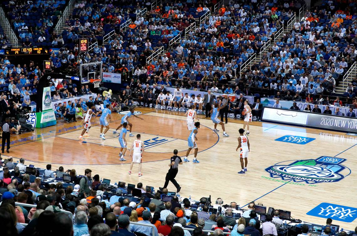 Fans watch during the first half of the North Carolina Tar Heels’ game against the Syracuse Orange in the second round of the ACC Tournament at the Greensboro Coliseum March 11, 2020. The Men’s and Women’s Basketball ACC Tournament returns to Greensboro in 2022.