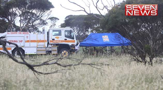 Emergency services at the scene of the fatal crash. Photo: Andrew Brooks.