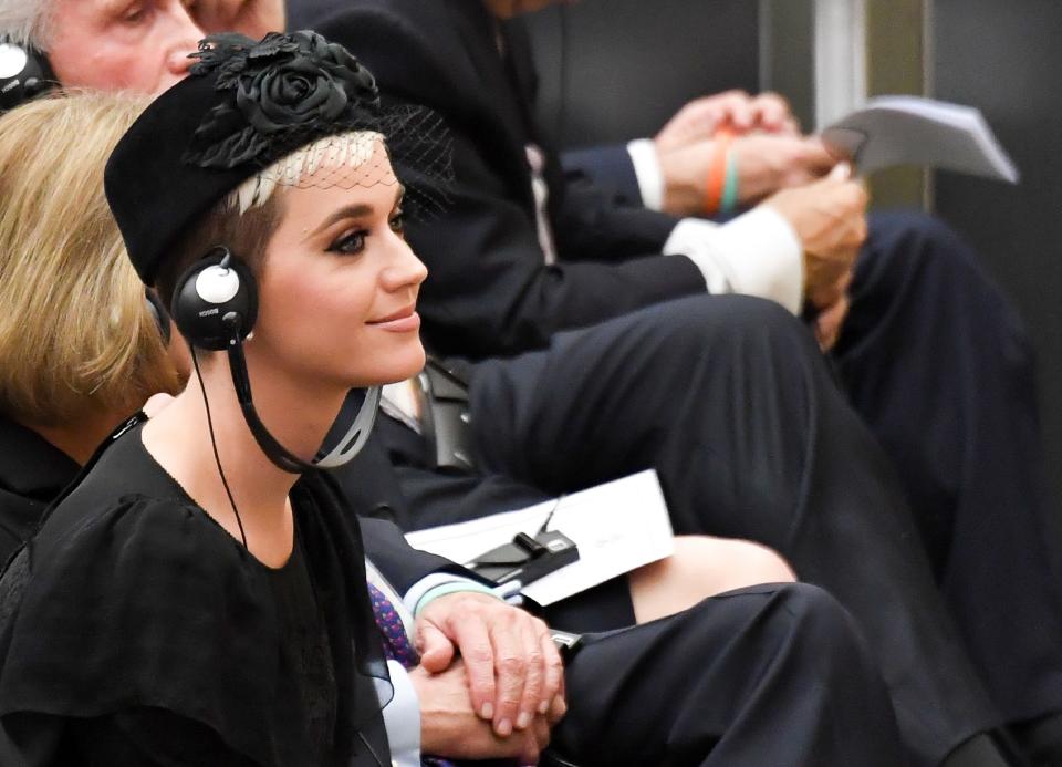 Katy Perry looks toward an unseen Pope Francis as he welcomes participants to a health conference at the Vatican on April 28. (Photo: ANDREAS SOLARO via Getty Images)