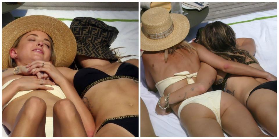 Miley Cyrus with a hat over her face as Kaitlynn Carter wears a yellow bikini and straw hat